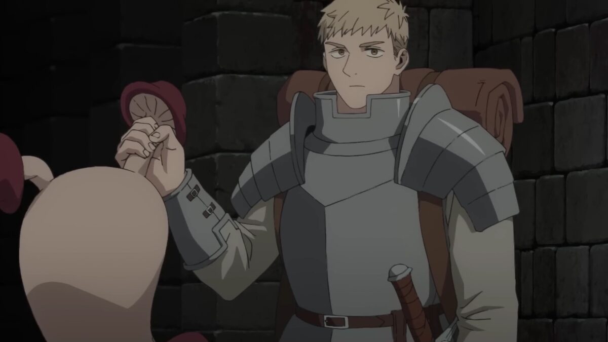Delicious In Dungeon PV Laios Holds Mushroom Monster