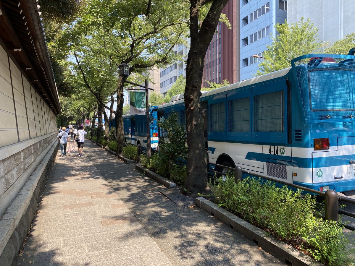 Approaching Yasukuni Shrine polite trucks