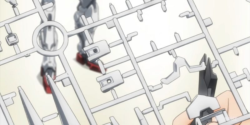 Gundam Build Divers characters removing Gunpla pieces using a nipper tool.