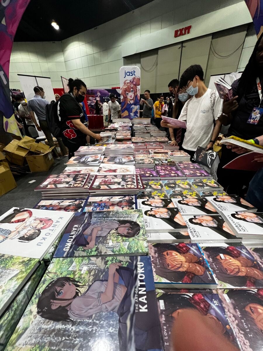 Browsing Books At The J List Booth 