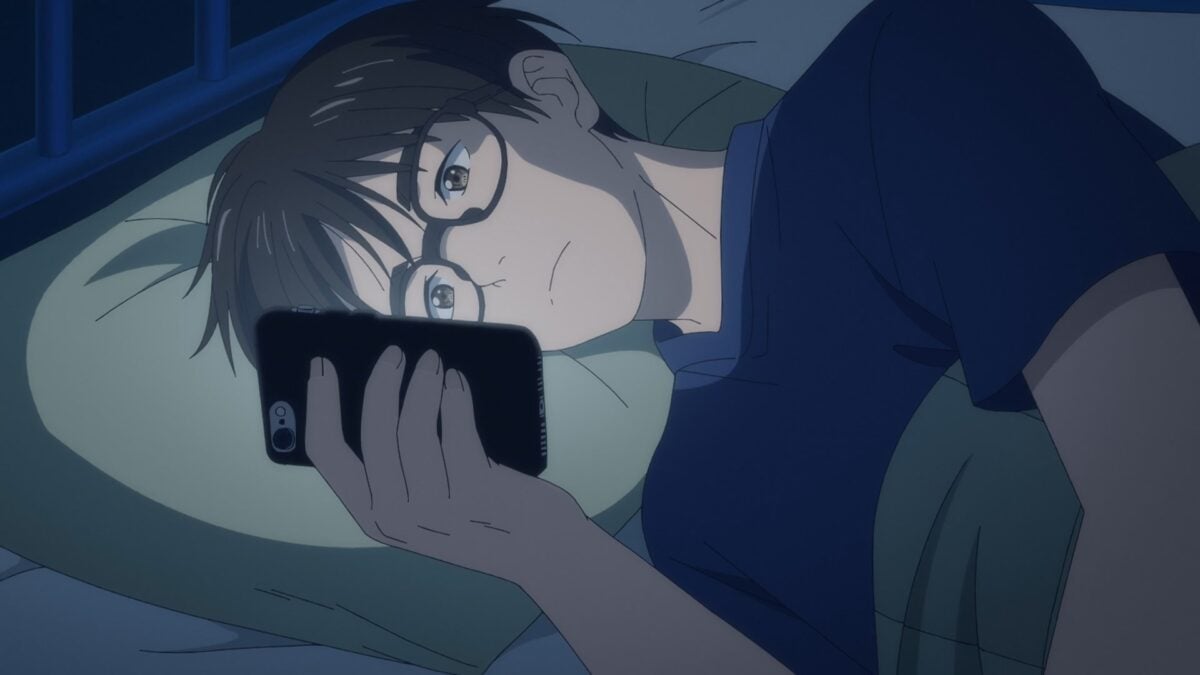 Nakami Reading His Phone